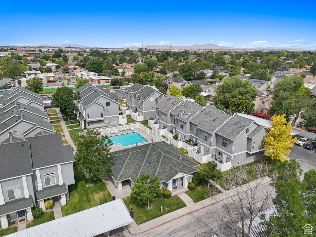 Aerial perspective of suburban area with a pool