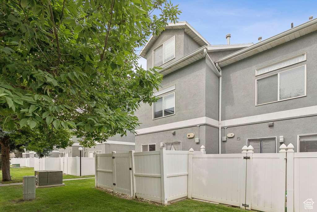 Back of house with stucco siding
