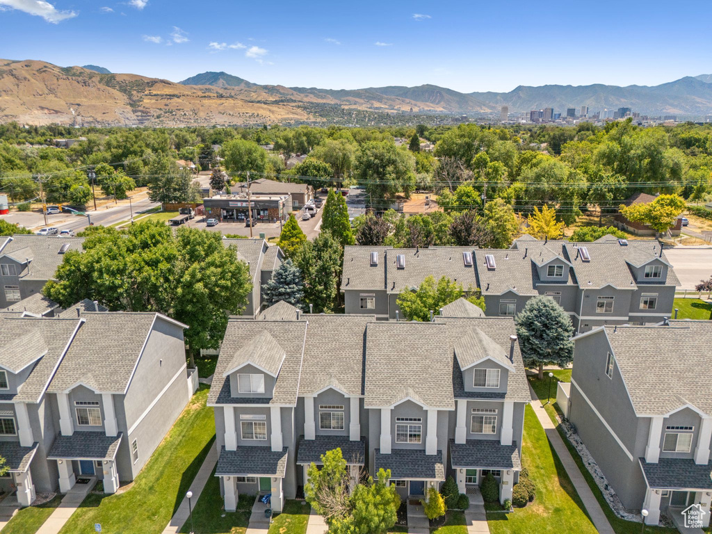Aerial view of residential area with a mountain backdrop