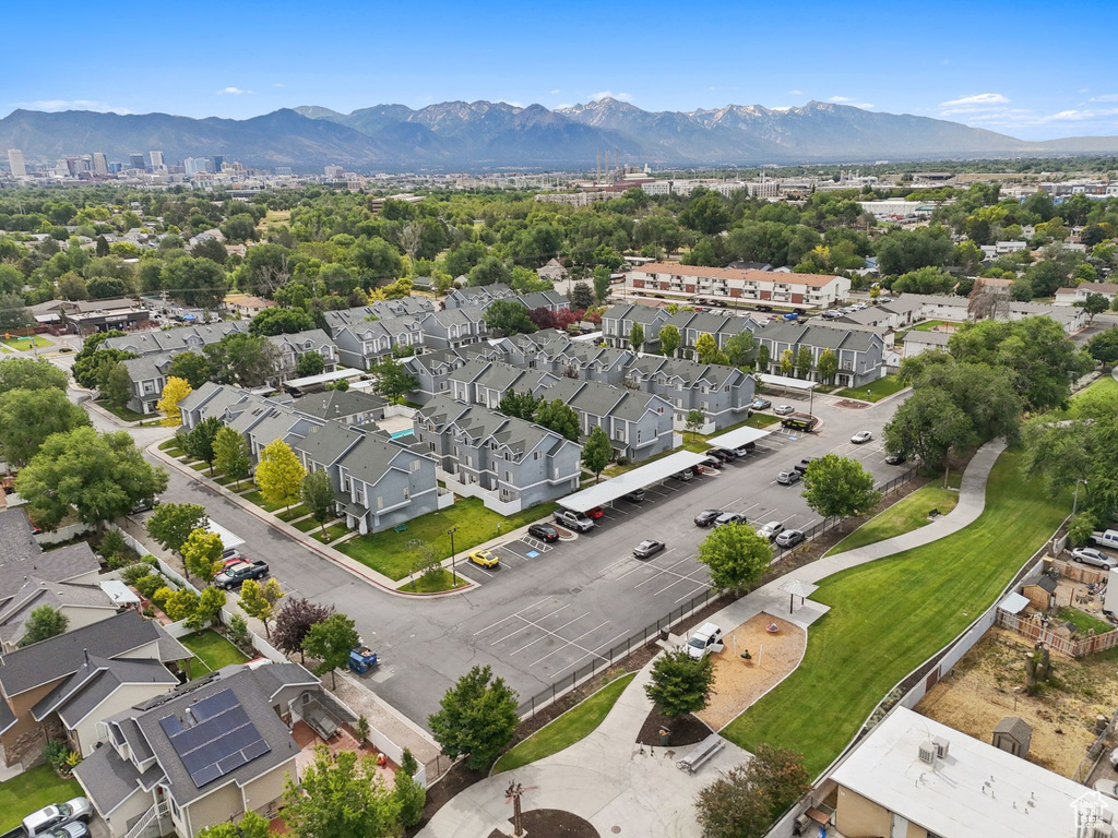 Aerial view of residential area with a mountainous background
