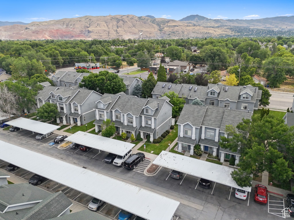 Aerial view of residential area featuring mountains