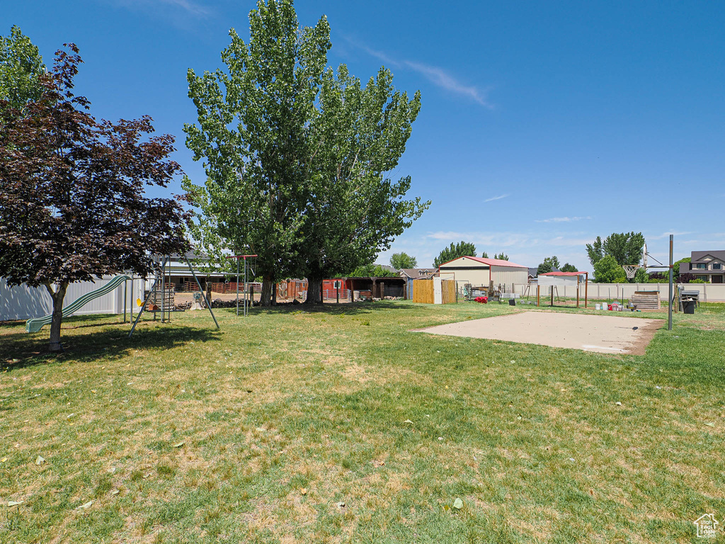 View of yard with a playground