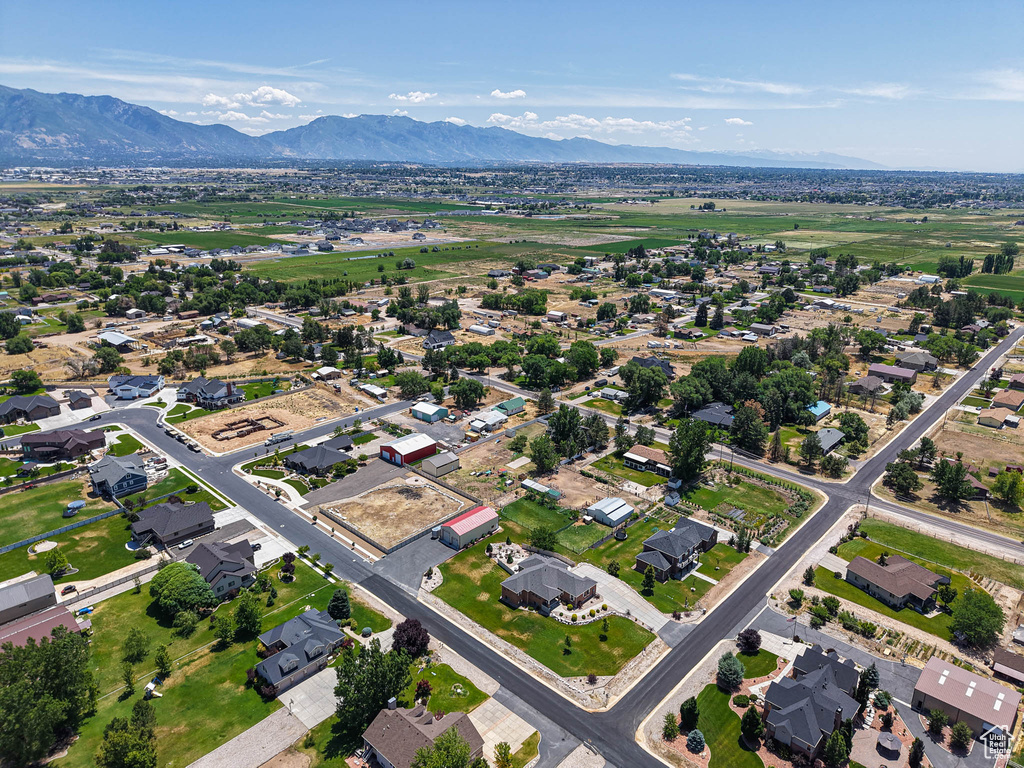 Aerial view of property\'s location featuring mountains