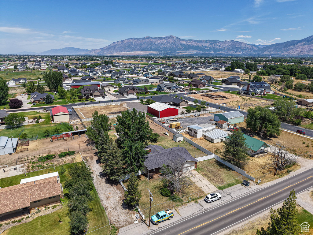 Aerial view of residential area featuring mountains