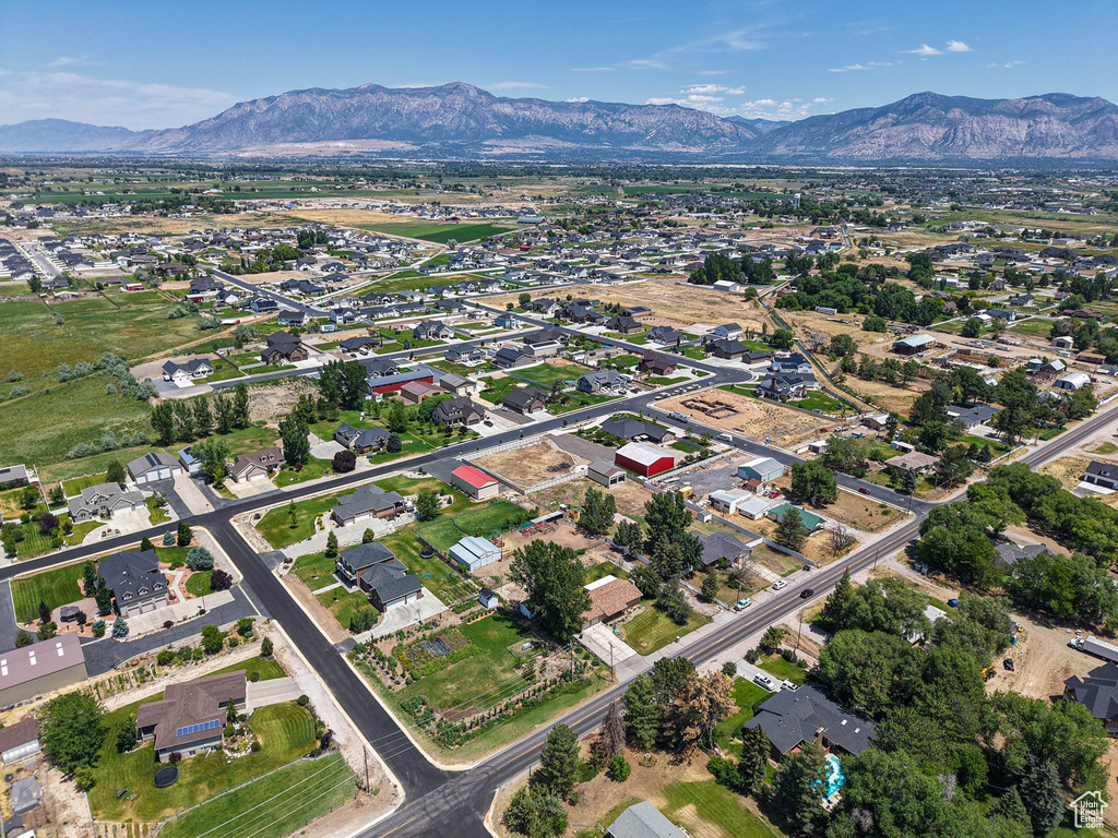 Aerial view of property\'s location featuring nearby suburban area
