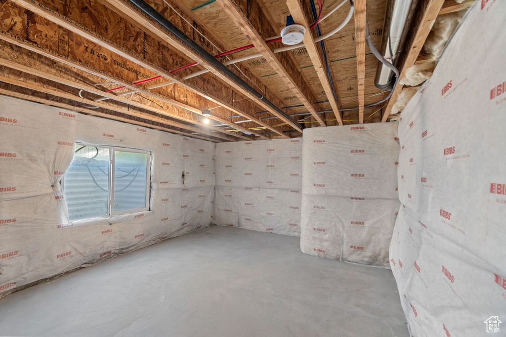Below grade area featuring heating unit