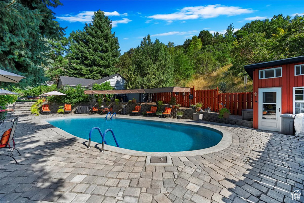 View of pool featuring a patio area