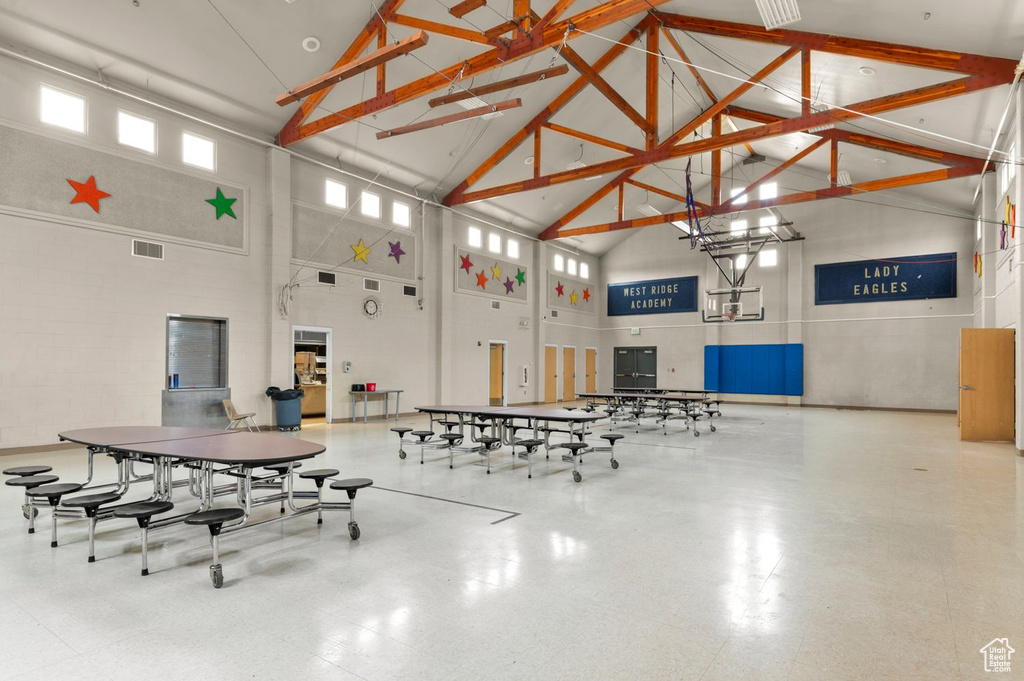 Miscellaneous room featuring high vaulted ceiling