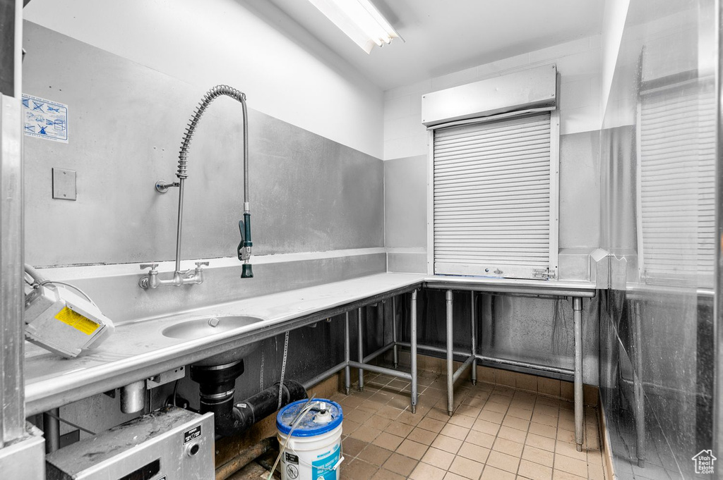Bathroom with tile patterned flooring