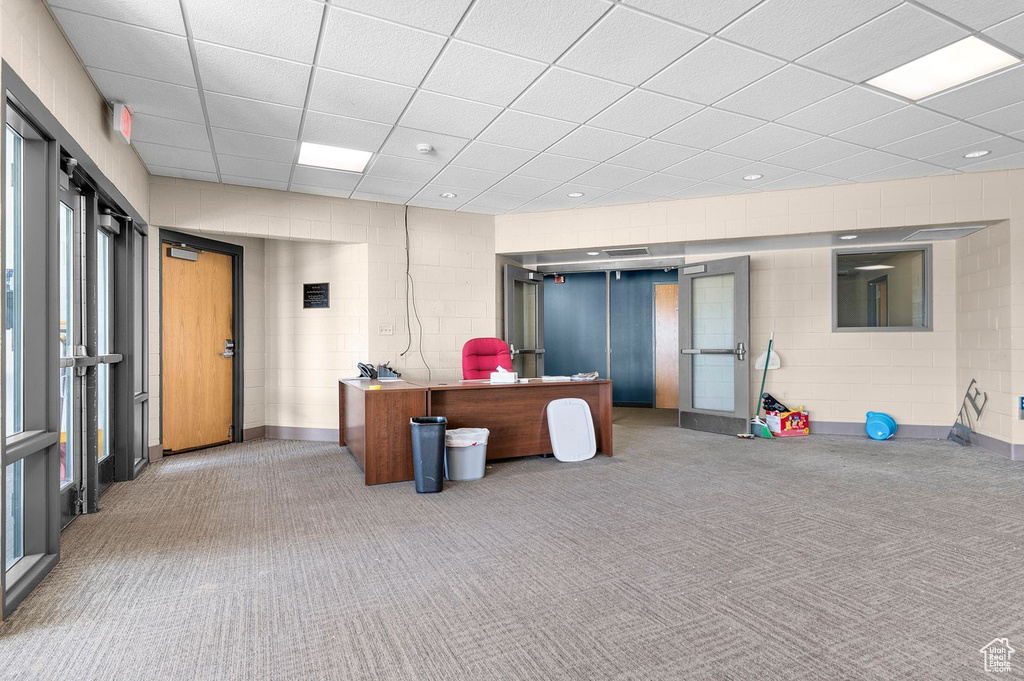 Reception area featuring a paneled ceiling