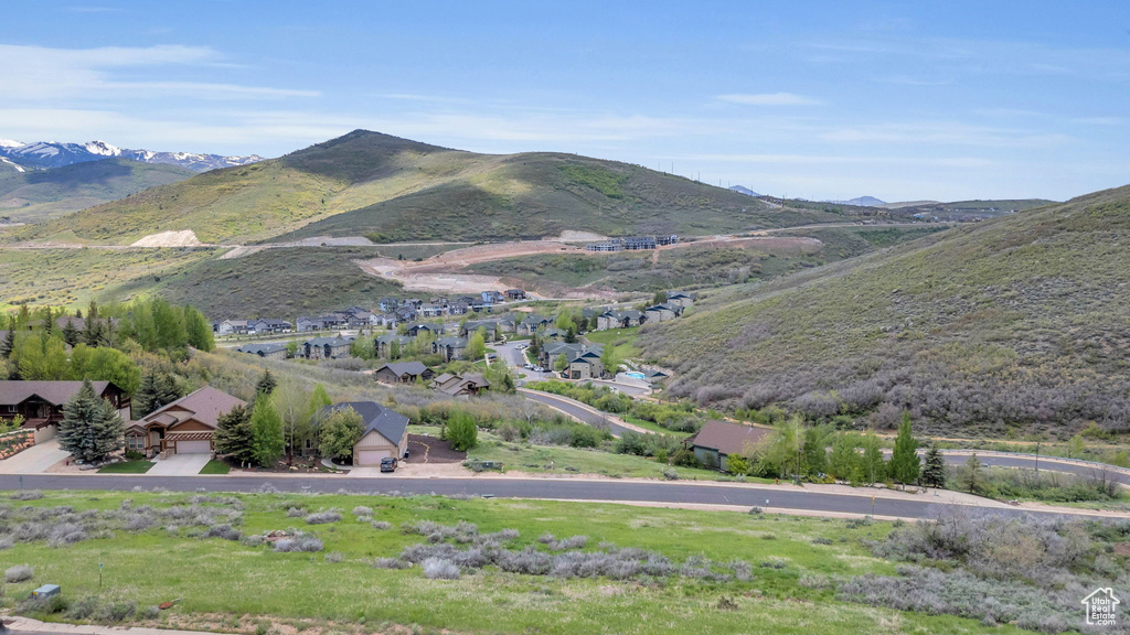 View of mountain backdrop with nearby suburban area
