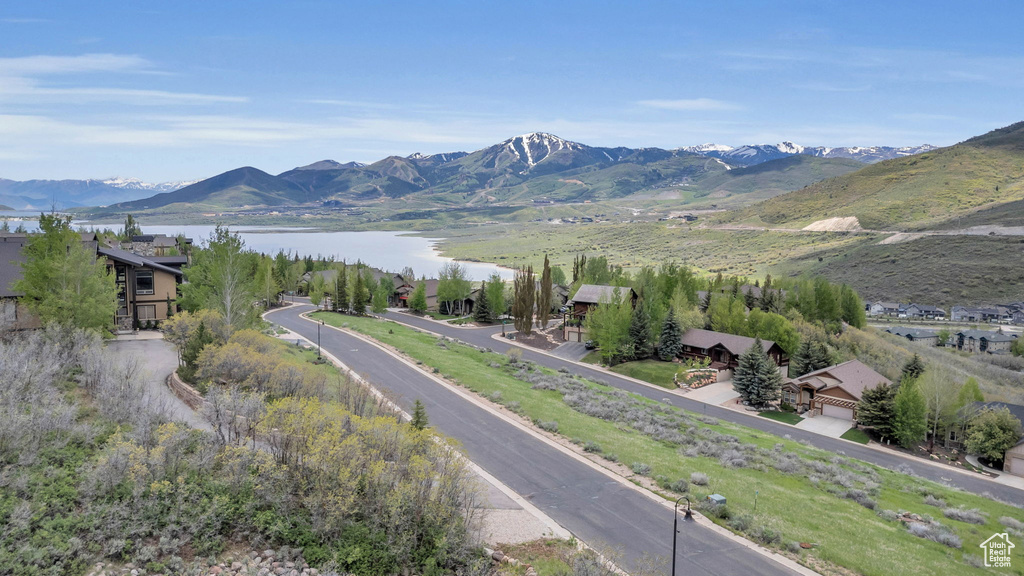 View of mountain backdrop with a nearby body of water