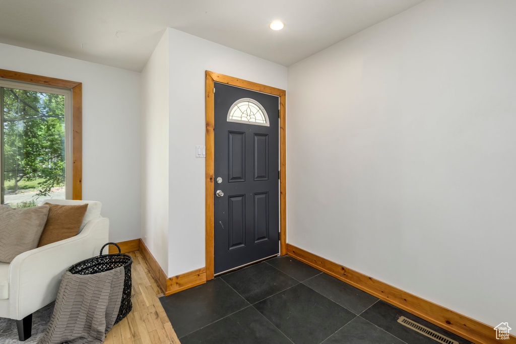 Entryway featuring healthy amount of natural light and recessed lighting