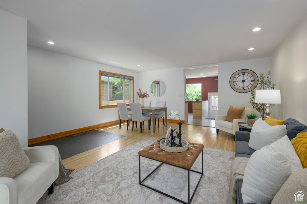 Living room featuring wood finished floors and recessed lighting