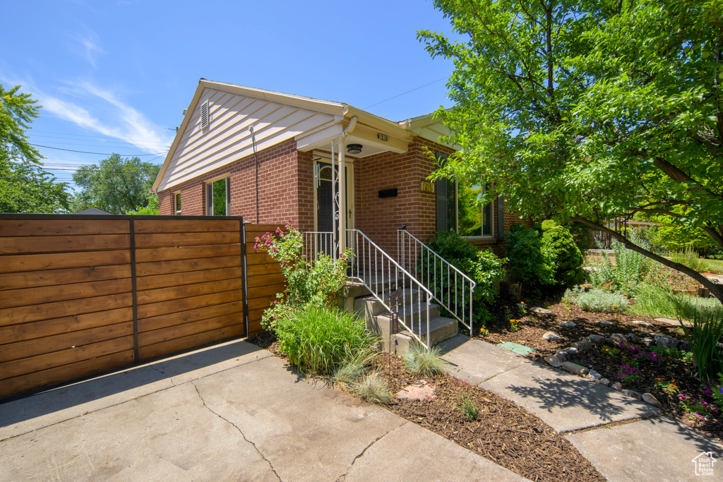 View of front of home with brick siding
