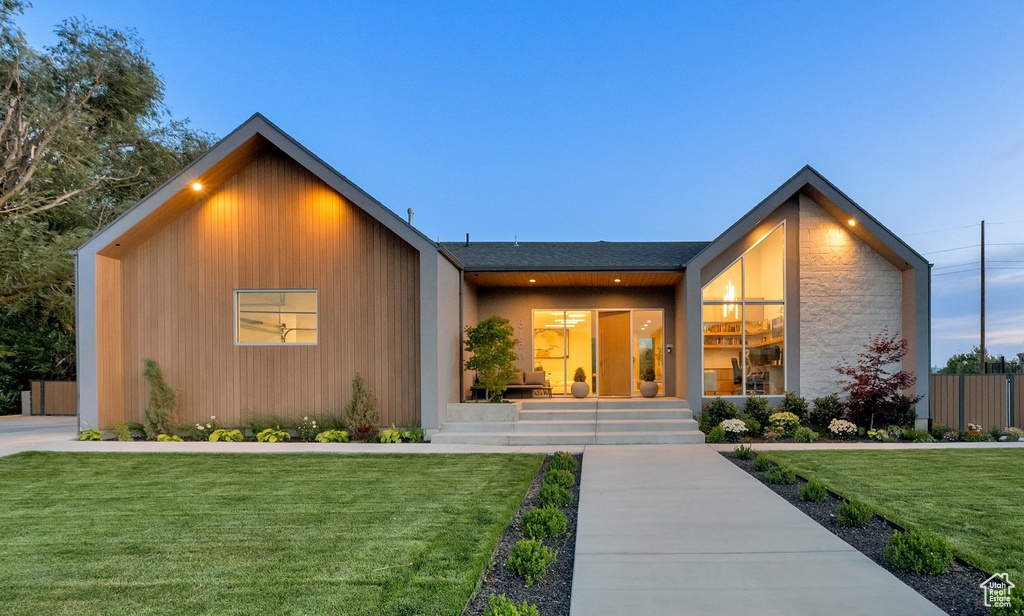 View of front of home with a front lawn