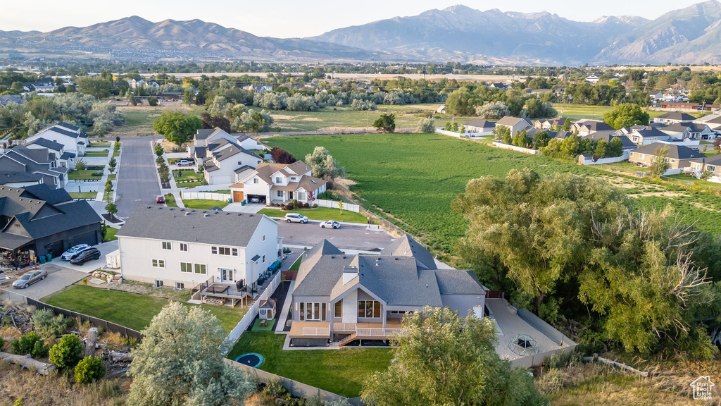 Aerial view of residential area featuring mountains