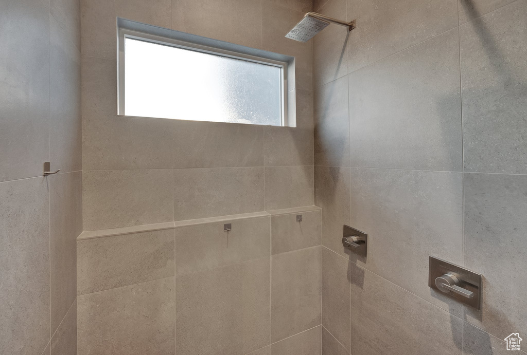 Bathroom with tiled shower