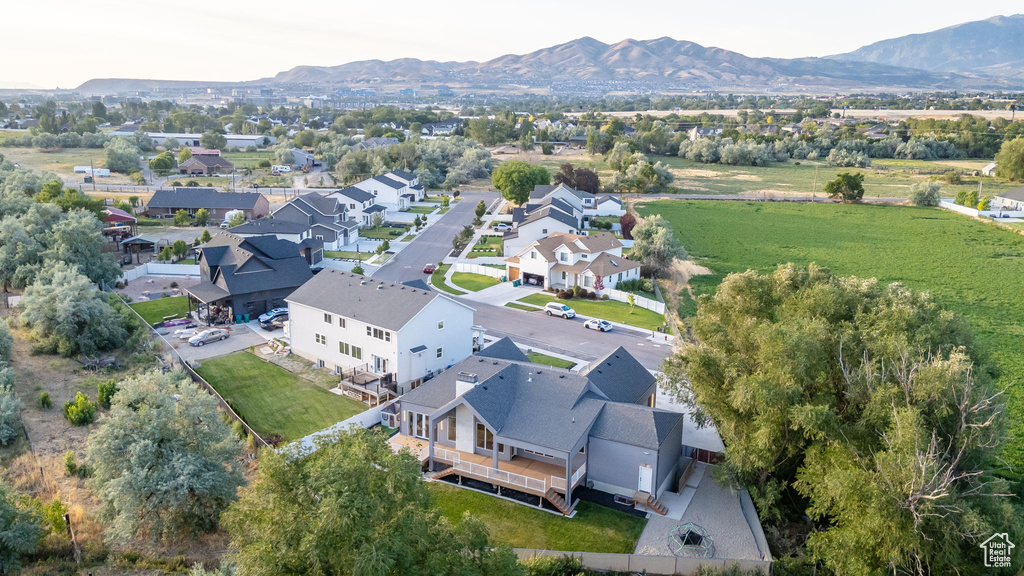 Aerial view of residential area with a mountain backdrop