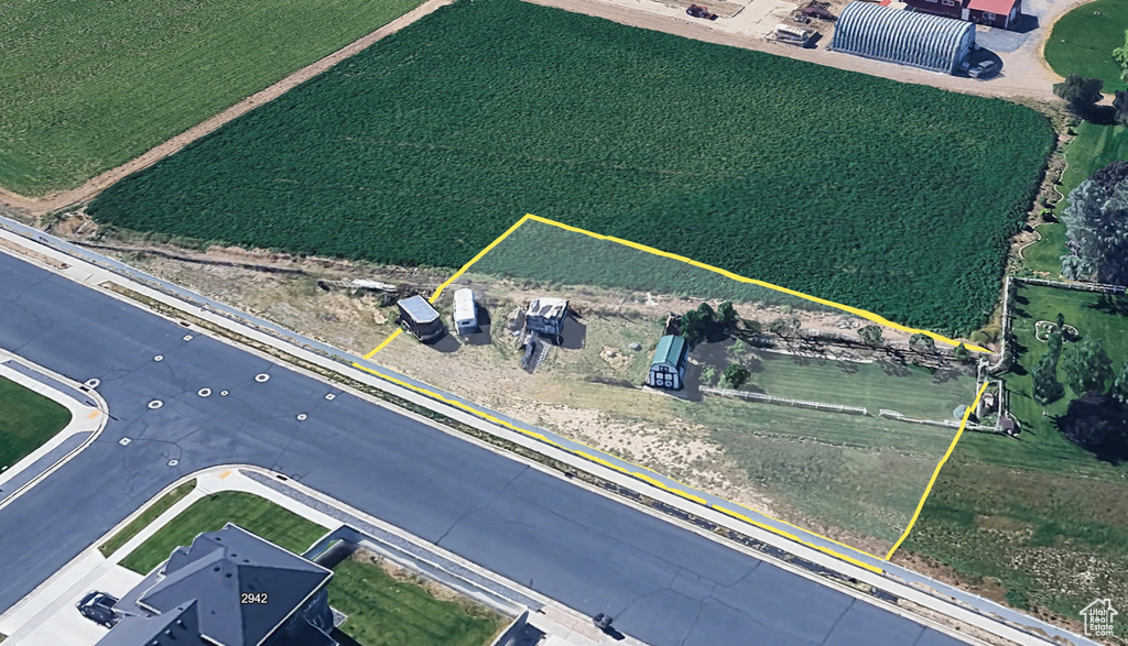 Aerial overview of property's location featuring property parcel outlined
