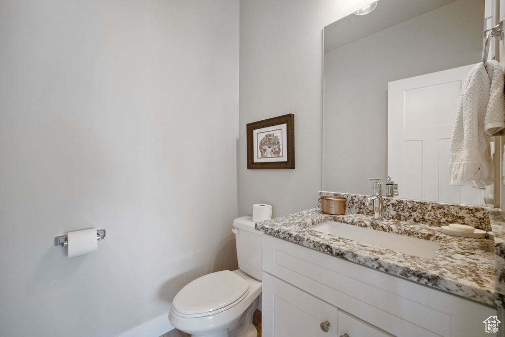 Bathroom with vanity and toilet