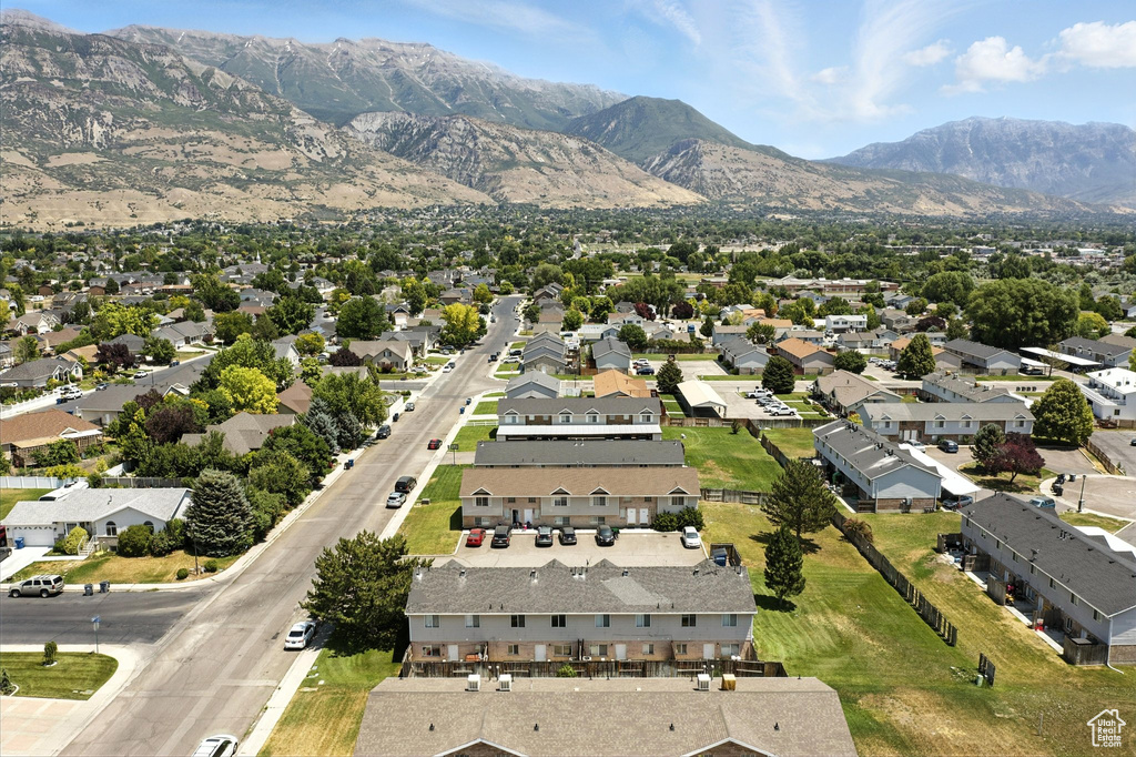 View of property location with a mountainous background and nearby suburban area