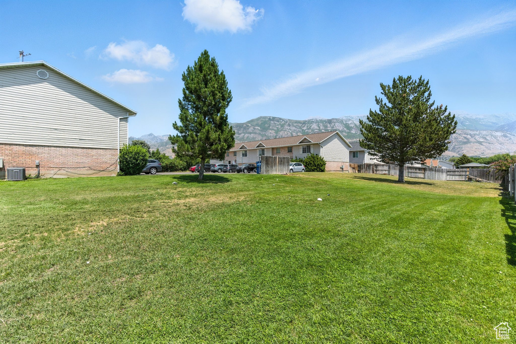 View of yard with a mountain view