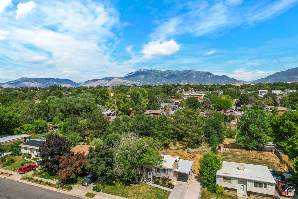 View of mountain background featuring nearby suburban area