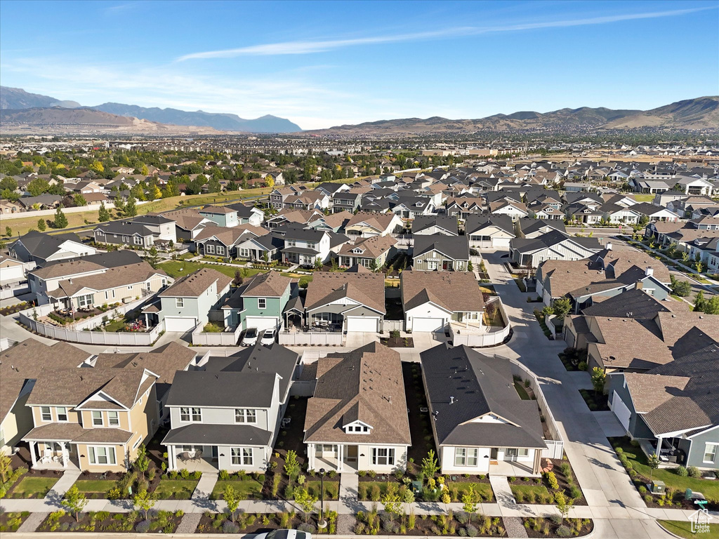 Aerial view of residential area with a mountain backdrop