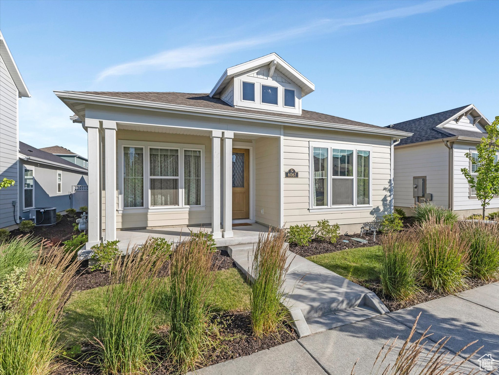 Bungalow featuring a porch