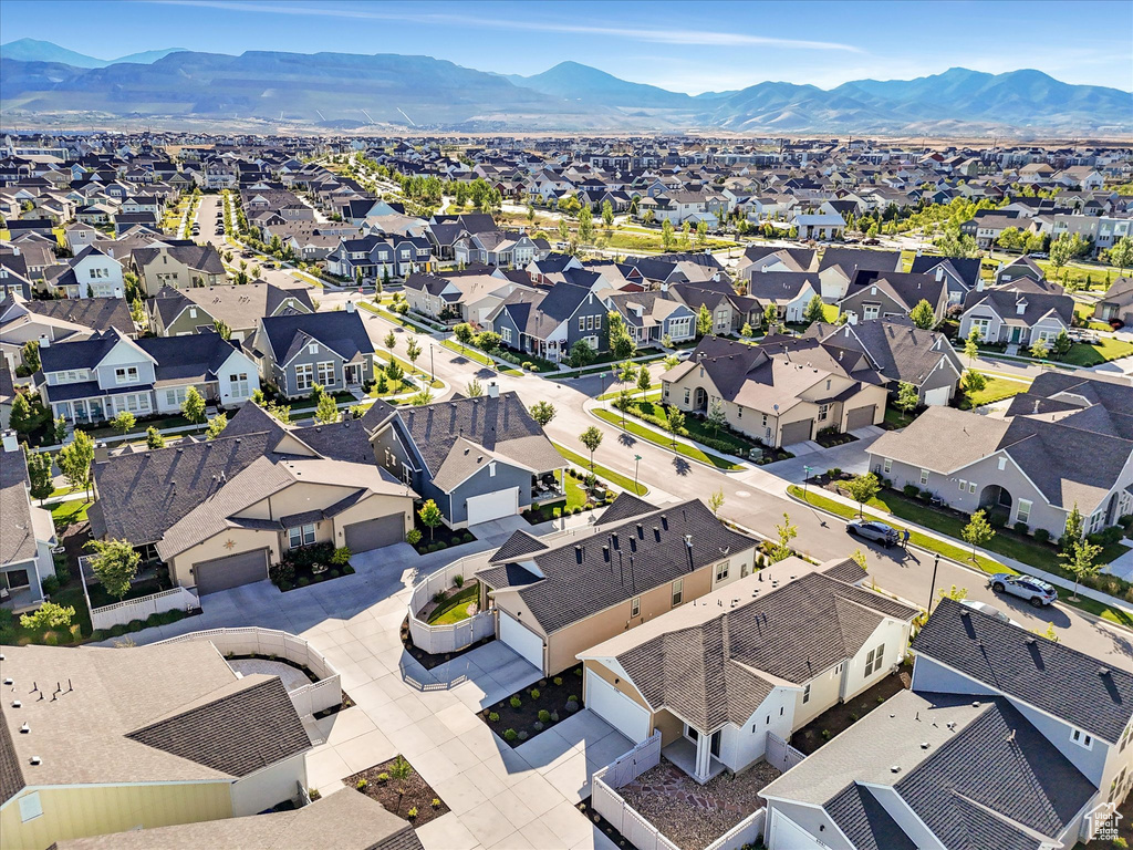 Aerial view of residential area with a mountainous background