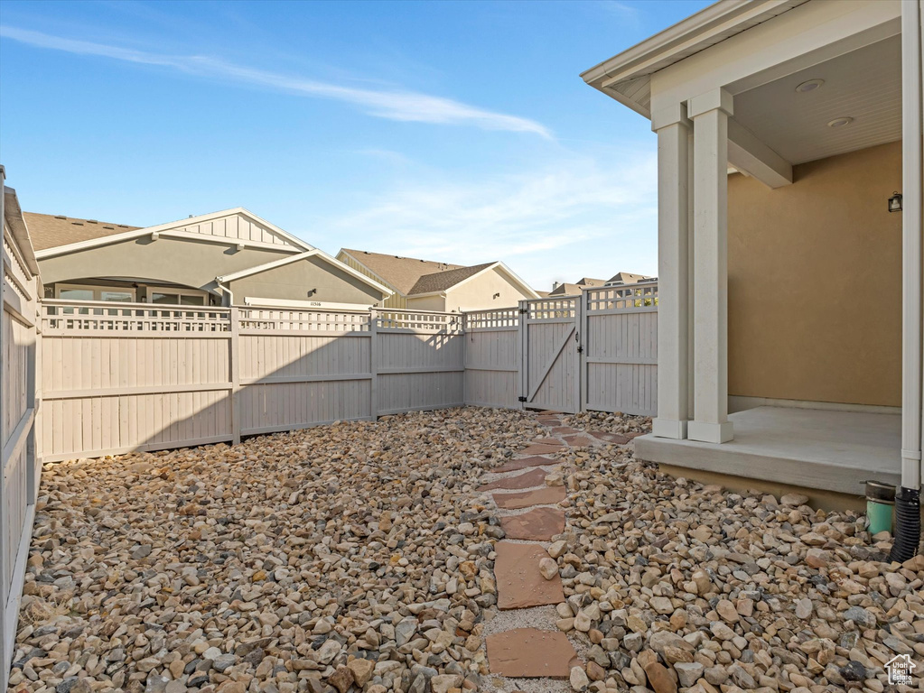 View of yard with a gate