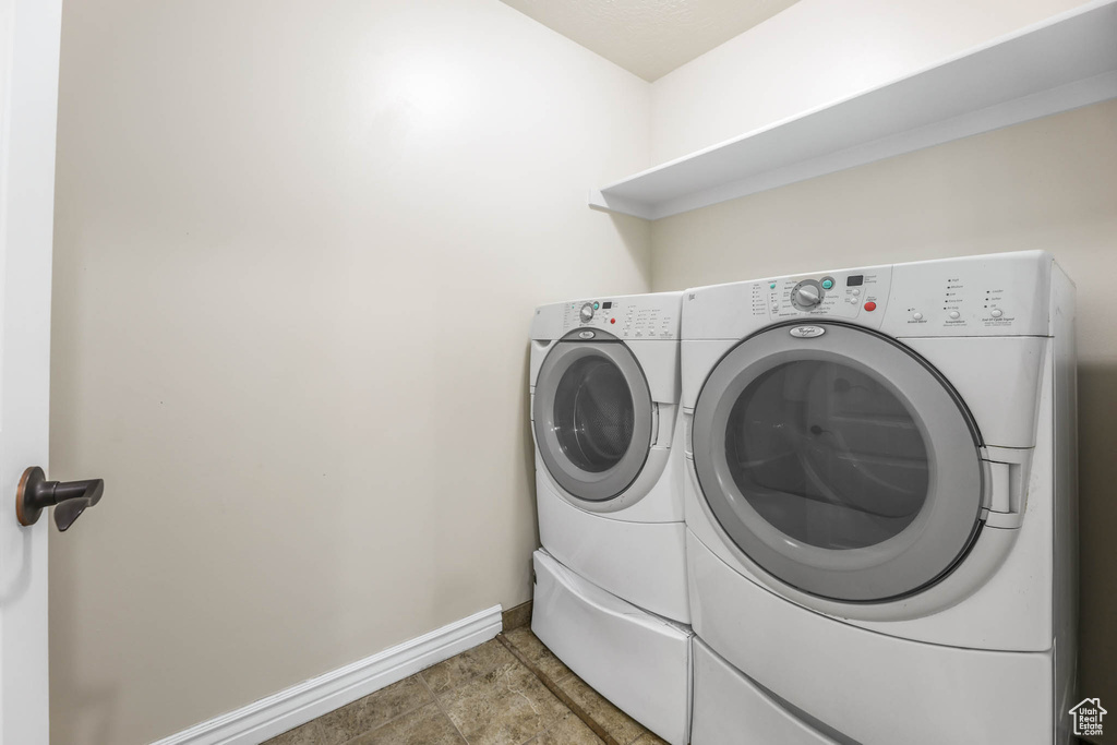 Laundry room featuring washing machine and dryer