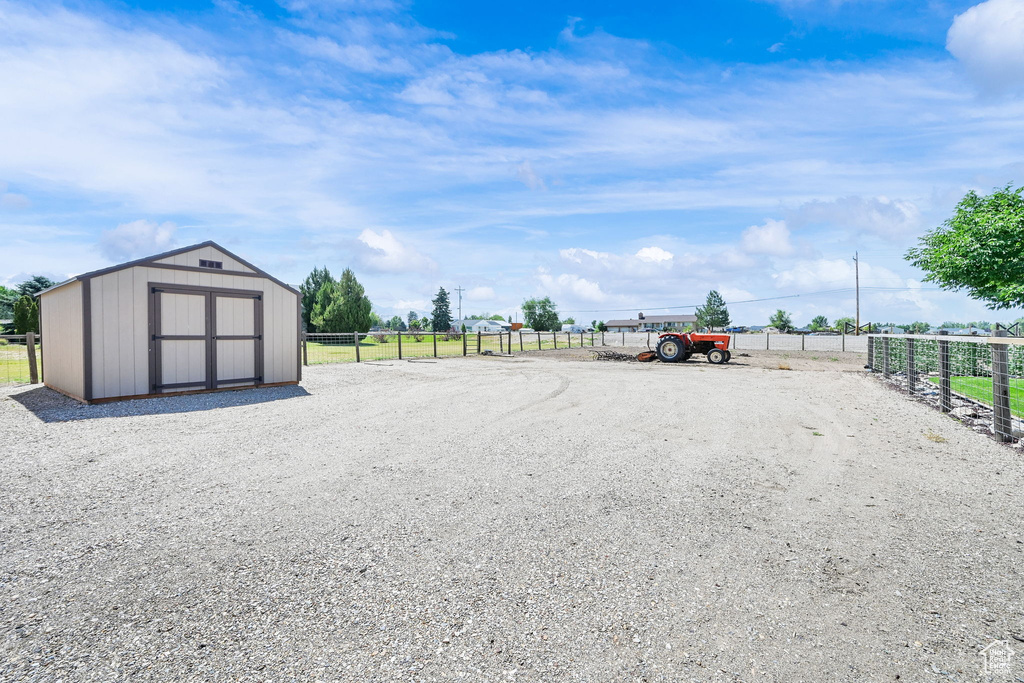 View of yard featuring a storage shed