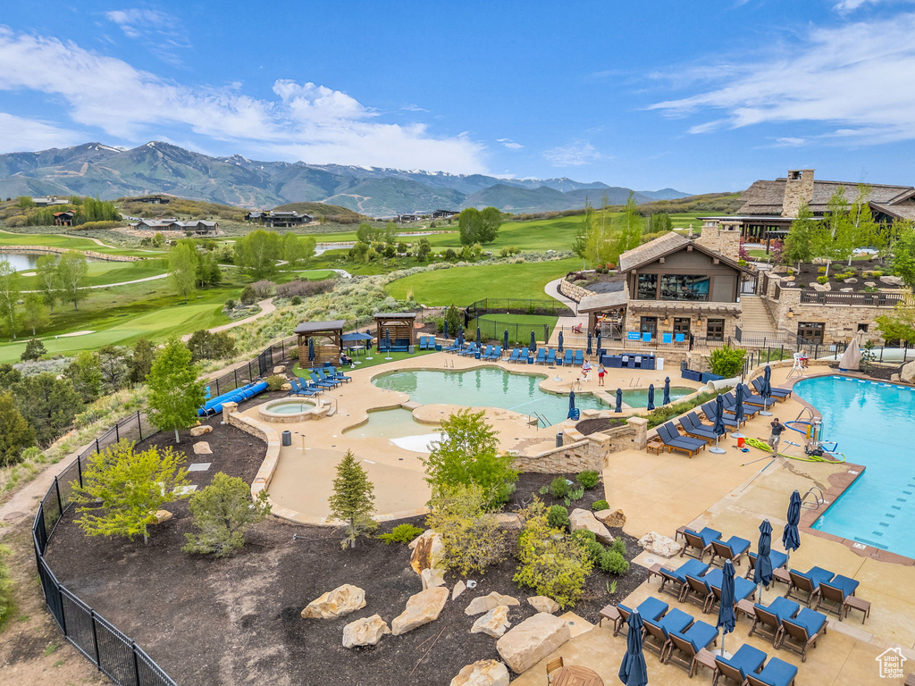 Bird\'s eye view of mountains and a pool