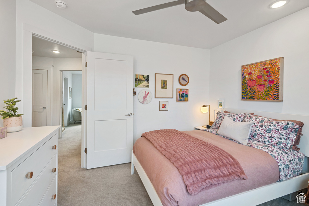 Bedroom featuring light colored carpet, recessed lighting, and a ceiling fan