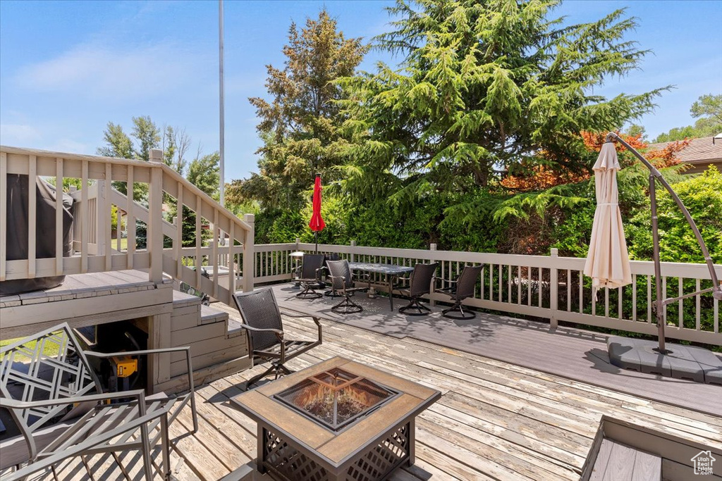 Deck featuring a fire pit