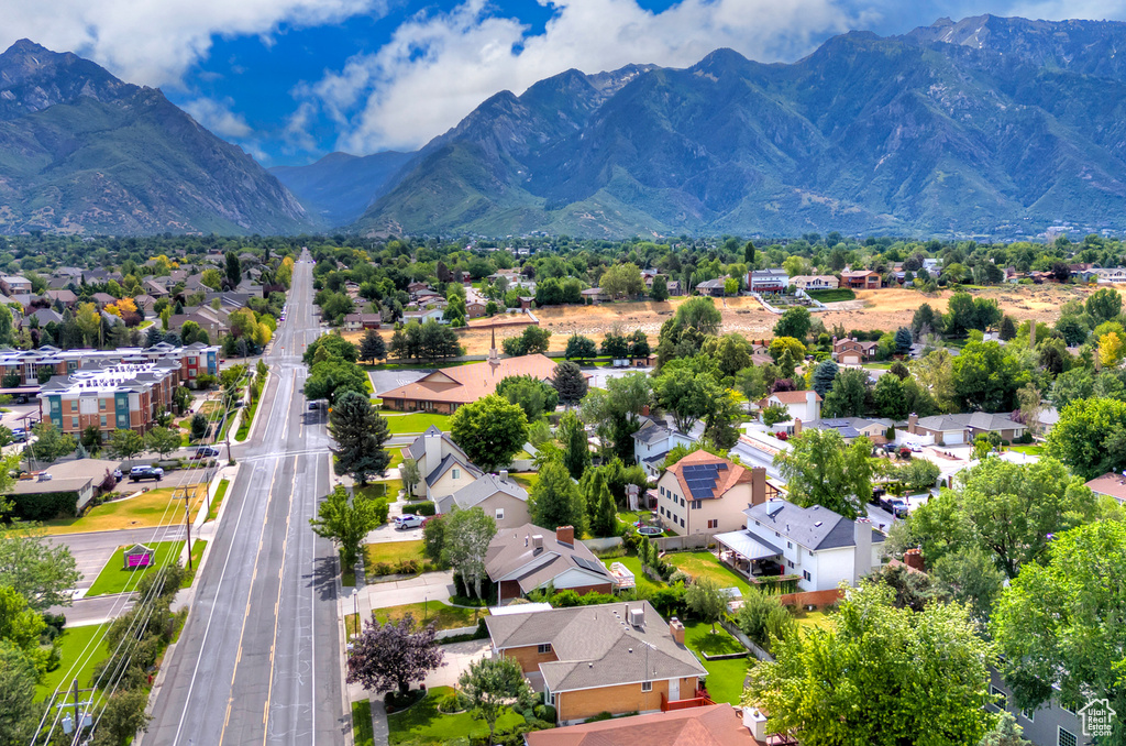 Aerial view of residential area featuring mountains