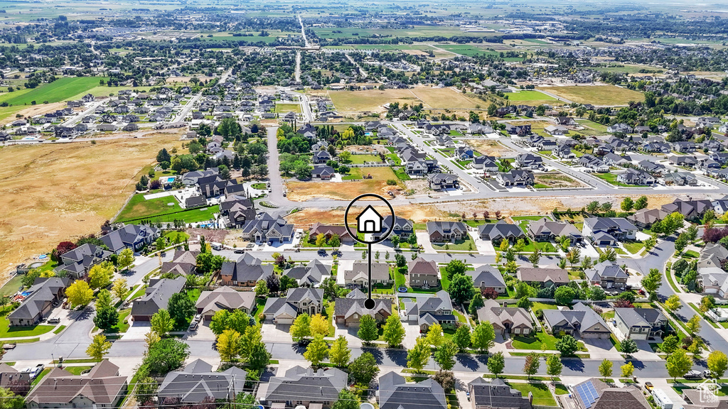 Aerial overview of property\'s location with nearby suburban area