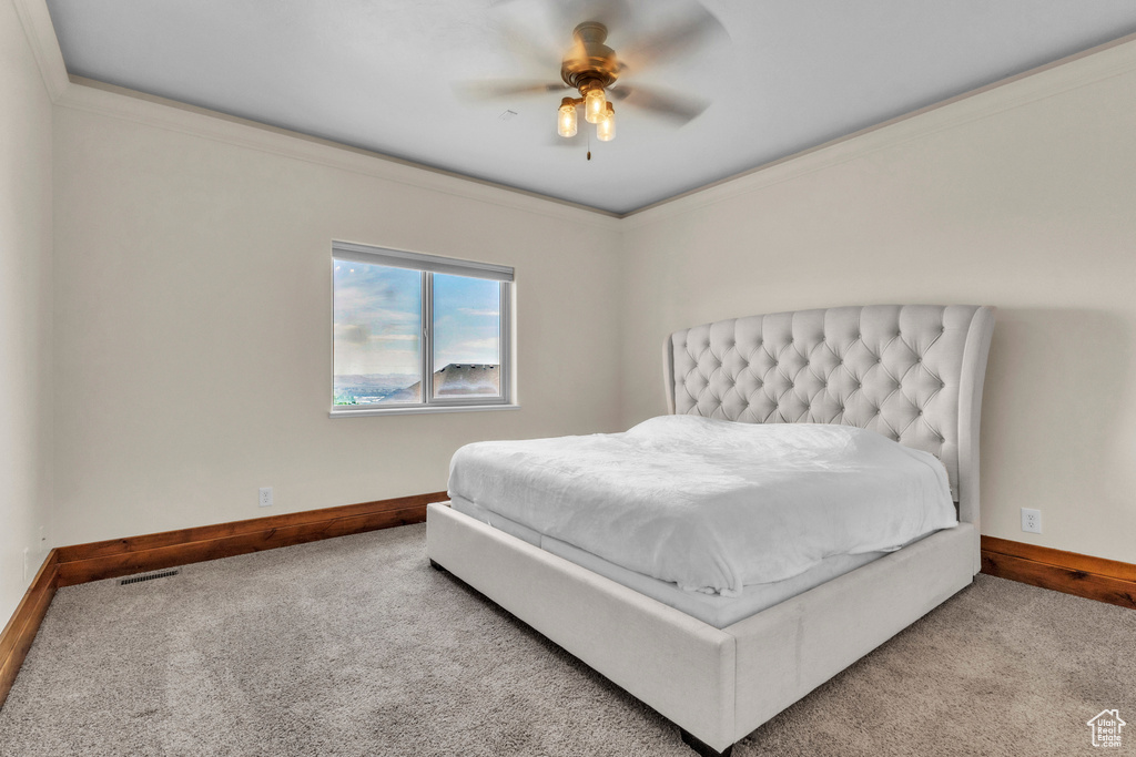 Bedroom featuring carpet floors and a ceiling fan