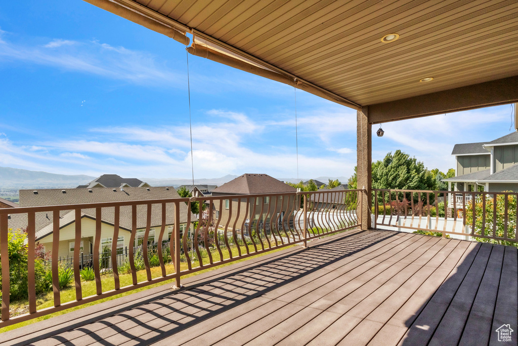 Wooden deck featuring a residential view