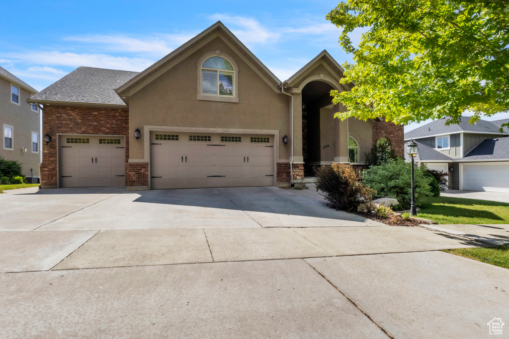 Traditional-style home featuring driveway