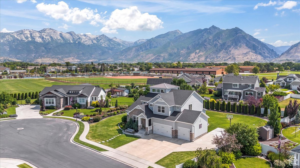 View of mountain backdrop with nearby suburban area