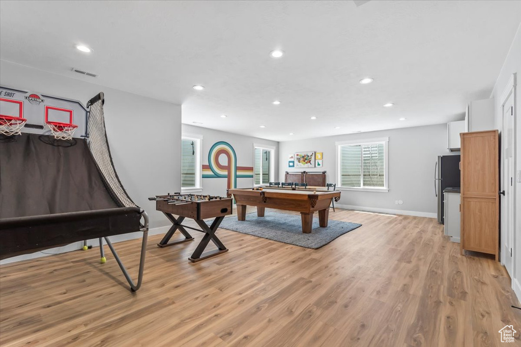 Playroom with light wood-style flooring, recessed lighting, and billiards table