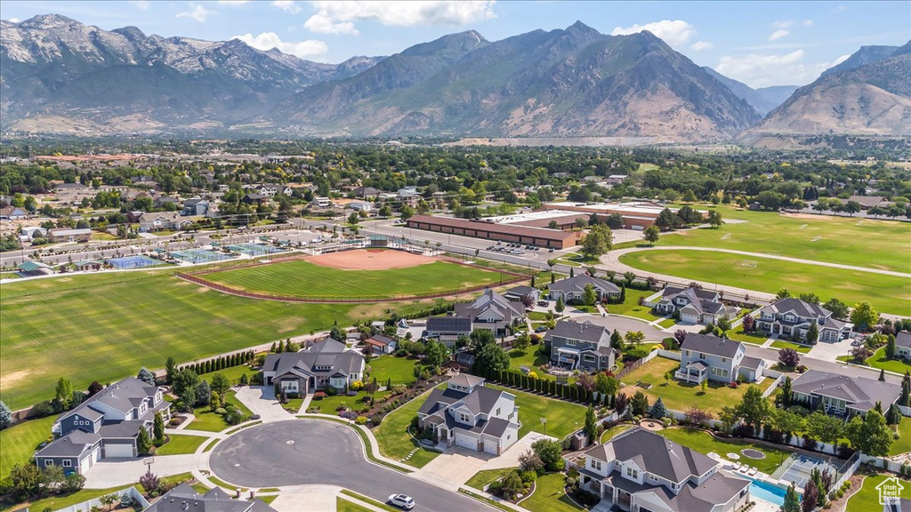 Aerial perspective of suburban area featuring mountains