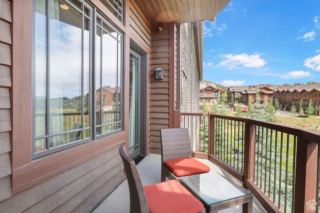 Balcony featuring a residential view