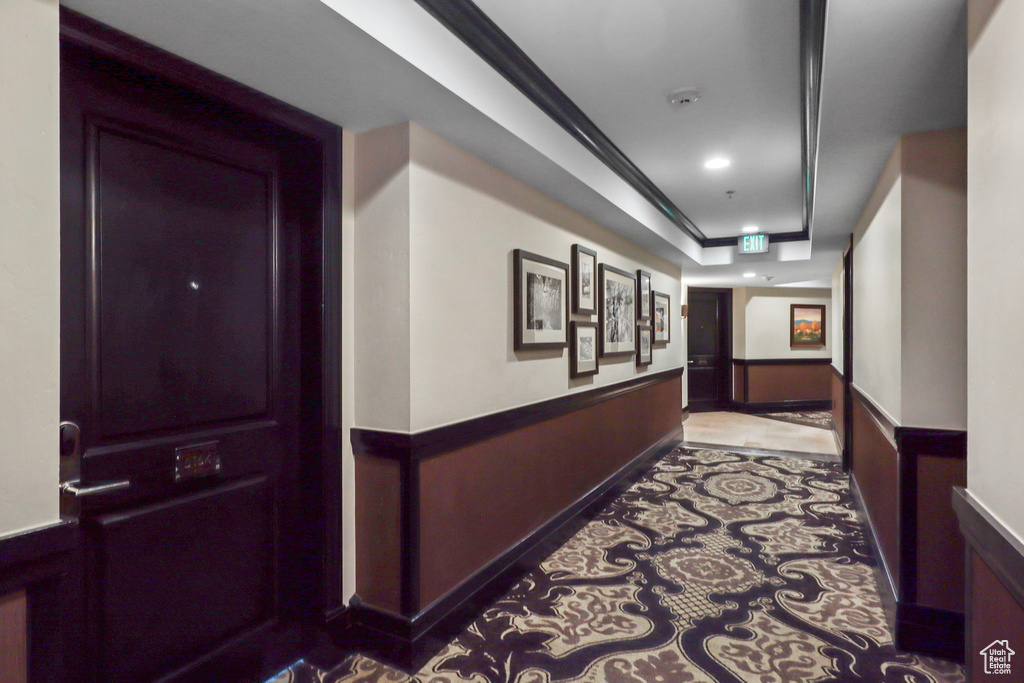 Hall featuring recessed lighting and crown molding