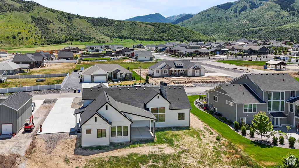 Aerial view of residential area with a mountainous background