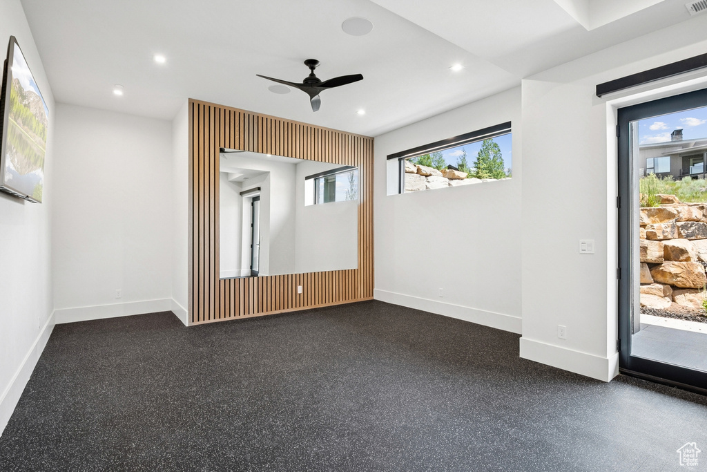 Spare room with plenty of natural light, ceiling fan, and recessed lighting