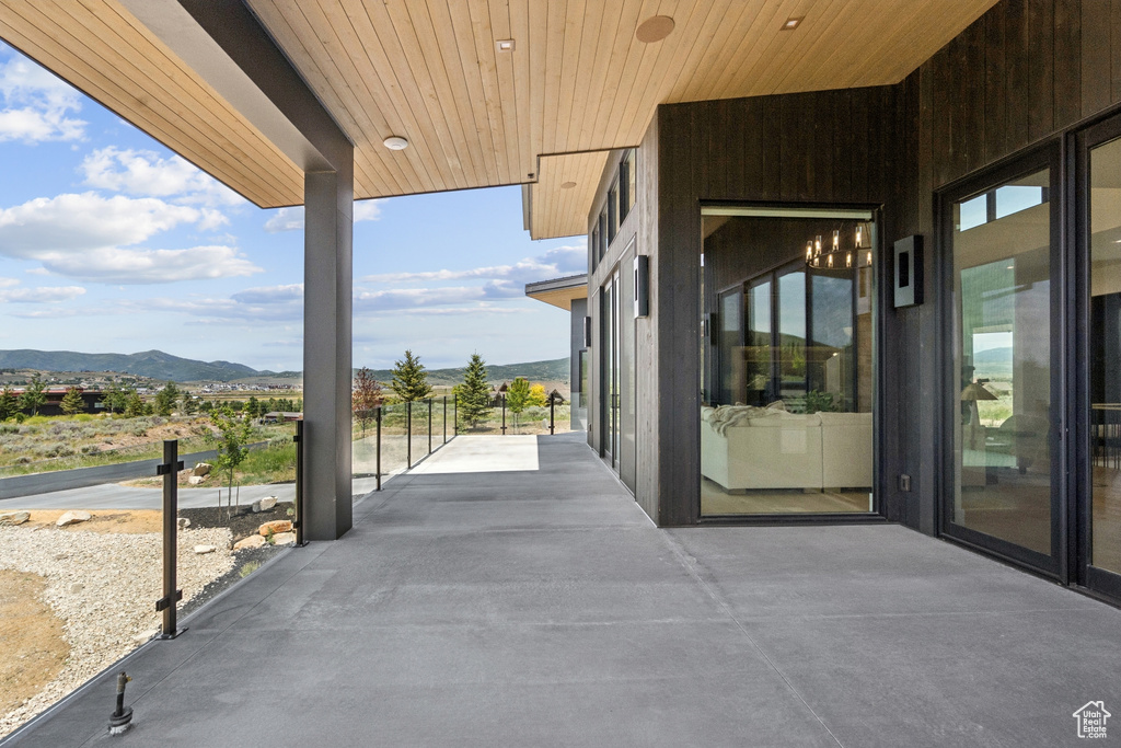 View of patio / terrace with a mountain view